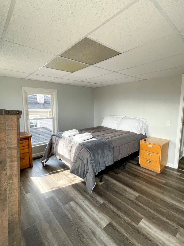 Large bedroom with queen bed