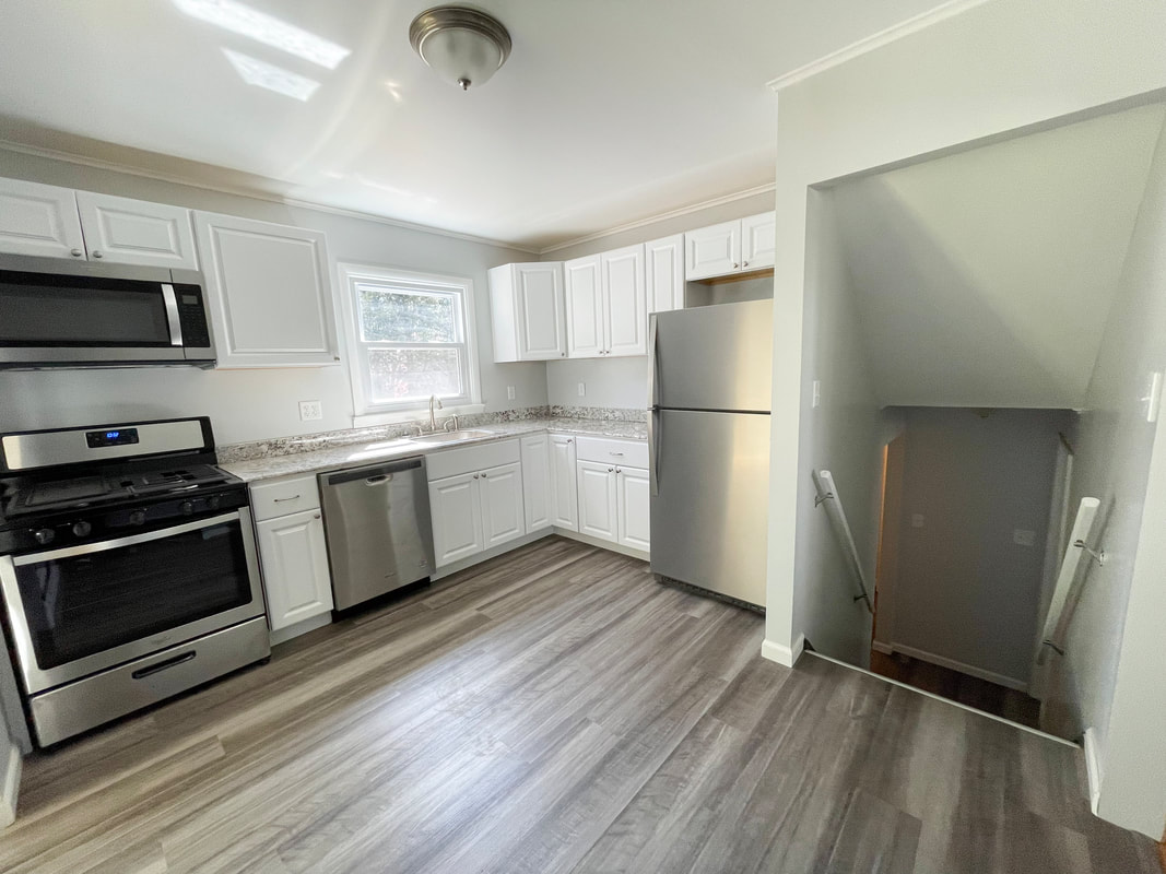 Open kitchen looking toward stairwell